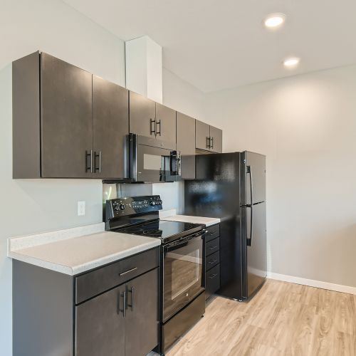 family cooking together in their 3-bedroom townhome