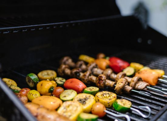 outdoor patio with seating and grilling stations