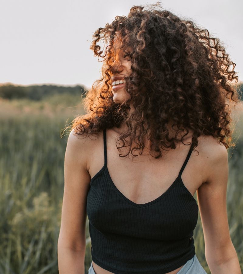woman enjoying sunset outside